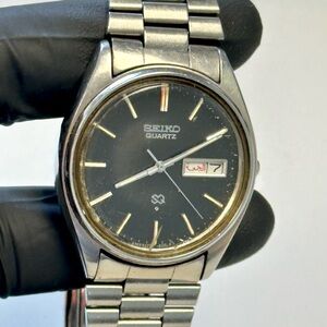 Seiko SQ 8223-8010 Arabic-Eng Black Dial Day-Date Silver SS 36mm Watch